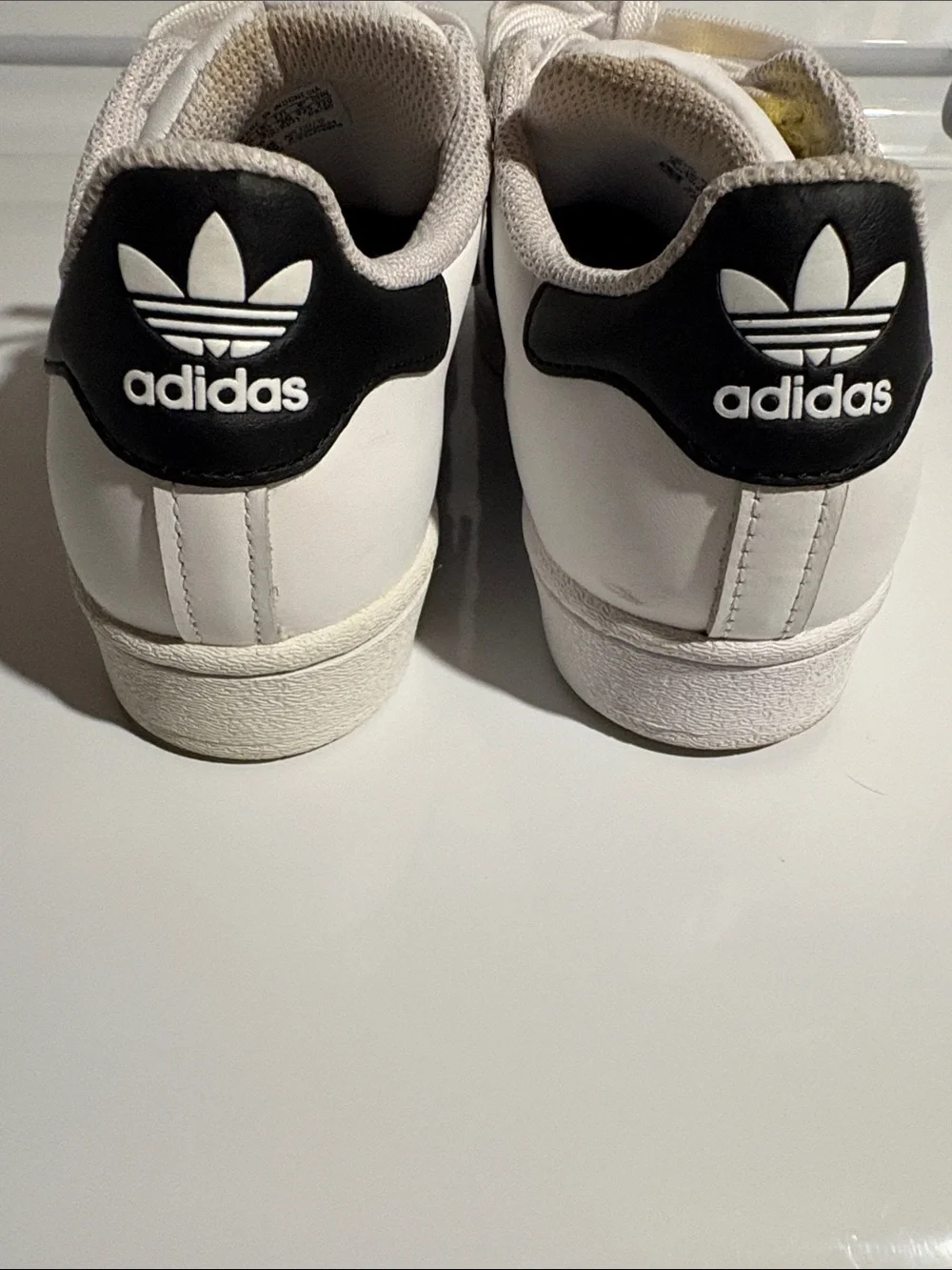 Adidas Superstar Big Kid Sneaker with white & black Shell-Toe Gold Accents